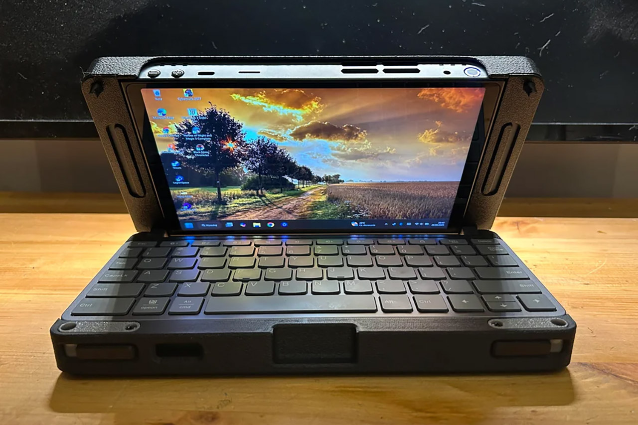 Modder becomes Legion. Convert a handheld into a large, portable laptop.